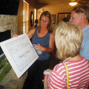 Picture of guests signing in for bunkhouse open house
